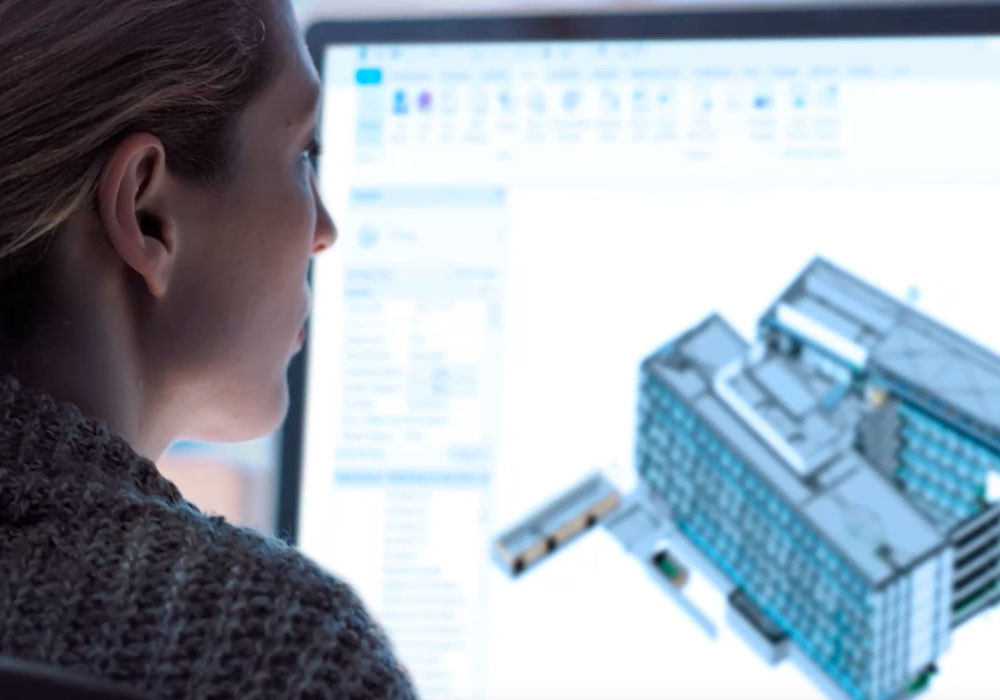Woman looking at 3D model in Revit